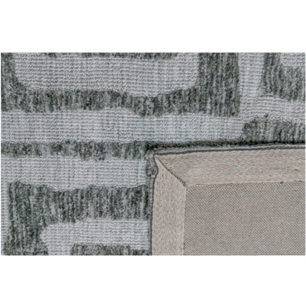 Un primer plano de un Tapete Decorativo Bally N2004, una alfombra gris y beige.